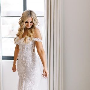 Wedding dress. Purchased in 2023. Custom sized.